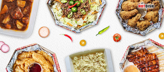 Hotdish food trays spread with beef caldereta, pancit sisig, buttered fried chicken, fish fillet tempura, pichi-pichi, and pork BBQ
